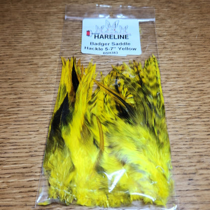 Hareline Badger Saddle Hackle Feathers 5-7 Inch – Yellow AVAILABLE AT TROUTLORE FLY TYING STORE AUSTRALIA