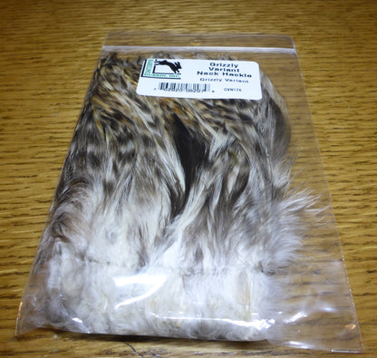 Hareline Strung Grizzly Variant Saddle Hackle 4-6 Inch AVAILABLE AT TROUTLORE FLY TYING STORE AUSTRALIA