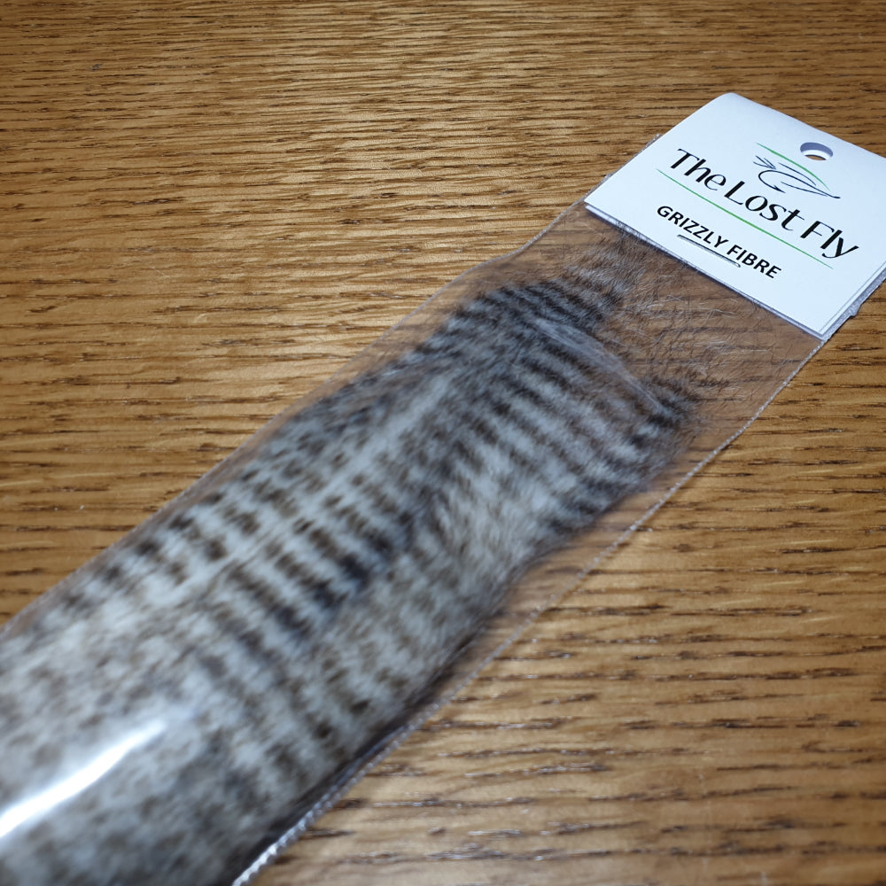 The Lost Fly Grizzly Fibre AVAILABLE AT TROUTLORE FLY TYING STORE AUSTRALIA