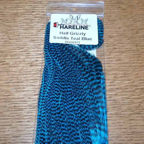 HARELINE GRIZZLY HALF SADDLE FLY TYING FEATHERS AVAILABLE FROM TROUTLORE FLYTYING STORE IN AUSTRALIA